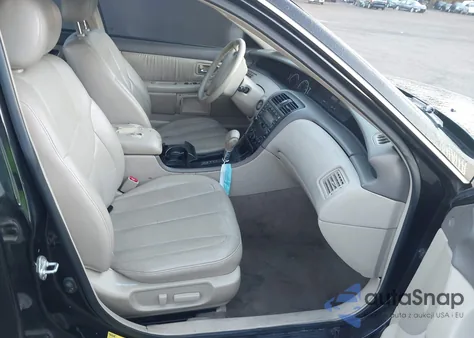 2002 Toyota Avalon Xl z USA, uszkodzony, nr VIN 4T1BF28B92U210113